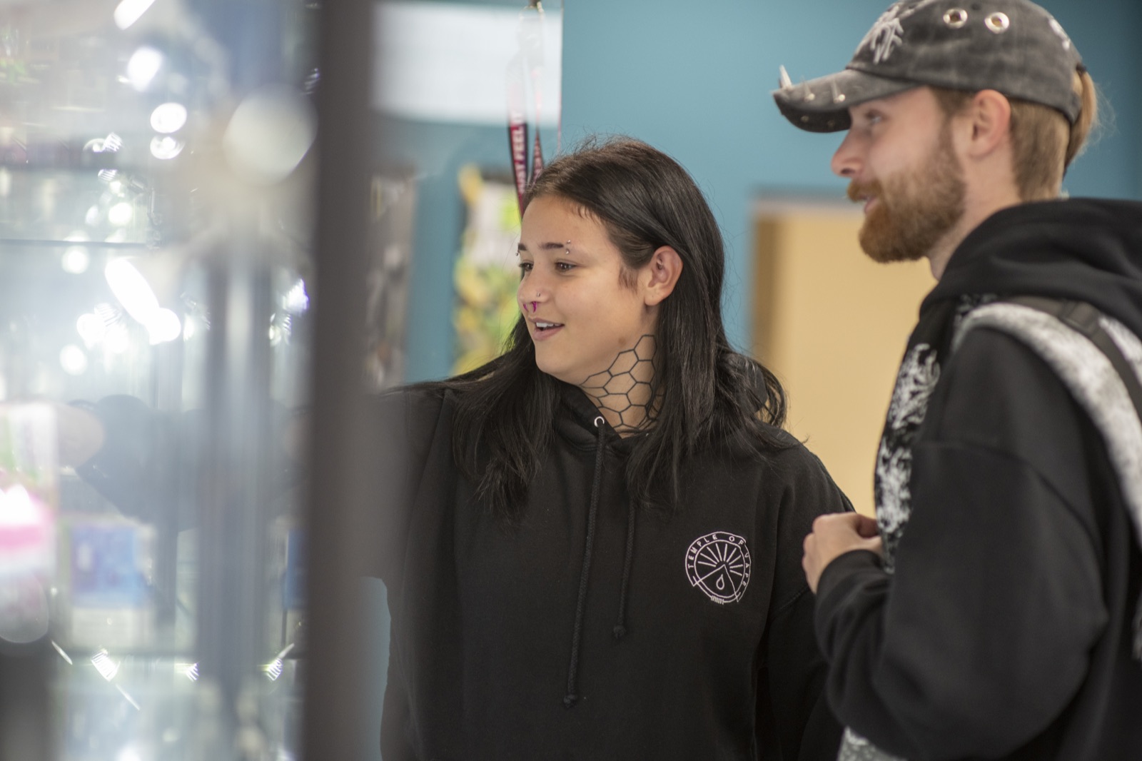 Helping a customer choose at our Duston vape shop